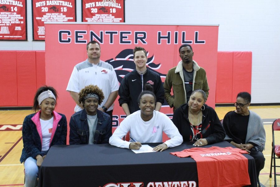 Carrington Kneeland signed March 23 to play basketball with Itawamba Community College.