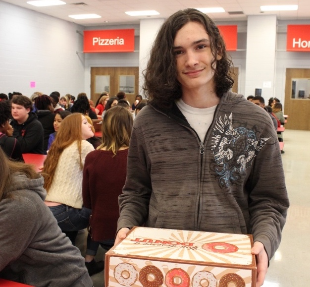 For making a perfect score on the ACT, Sebastian Askew was given a dozen doughnuts at the honor roll breakfast in January.