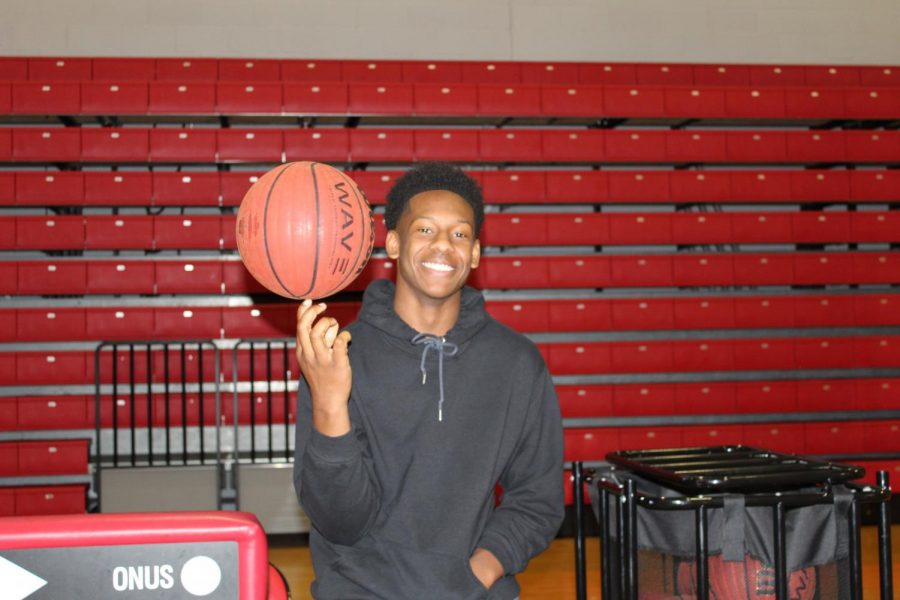 As one of four managers for the boys basketball team, Anthony Moose Edwards does everything from washing game uniforms and practice uniforms to sweeping the floor, running the clock during practice, and keeping stats.