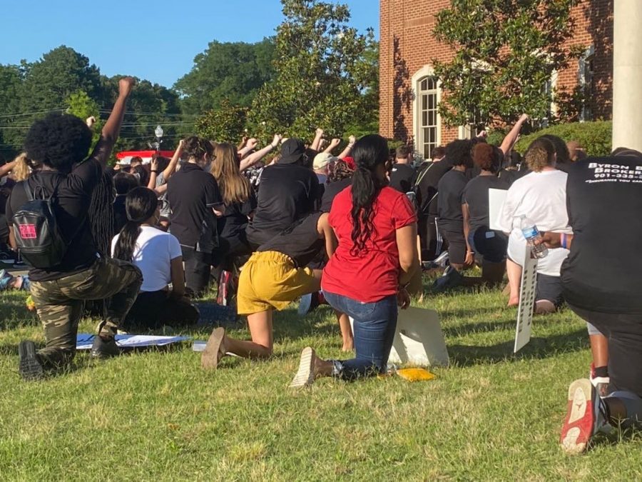 At a peaceful Black Lives Matter protest June 6 in front of the Olive Branch City Hall, protesters kneeled on the ground for 8 minutes and 46 seconds, the amount of time Derek Chauvin pinned George Floyd to the ground. The group prayed and raised their fists against systemic racism in this country.
