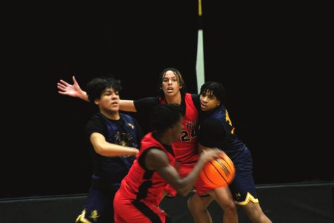 Boys Basketball battles Olive Branch in jamboree | Game slideshow.