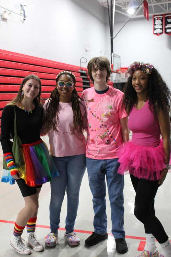Ava Hendricks (left), Chelsi Freeman (middle-left), Matthew Crocker (middle-right), and Layla Lawson (right) dress up for Interacts booth, Candy Land.