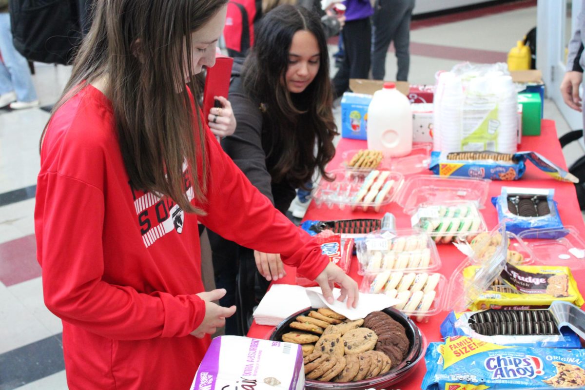 Center Hill students treated themselves to milk and cookies and other snacks during the annual tree decorating event.