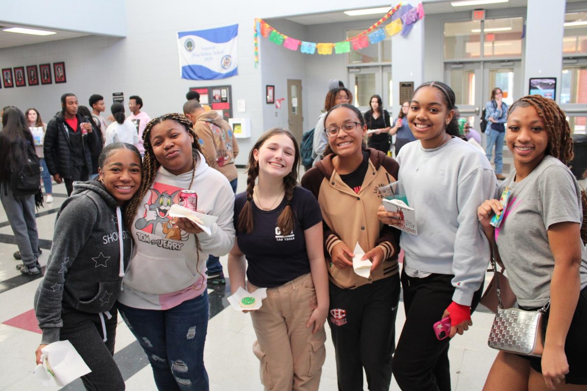 After visiting the refreshment table, a group of CH students took a second and posed for the camera.