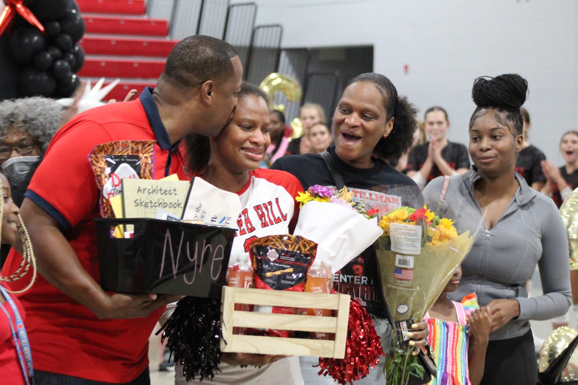 Volleyball celebrates win against South Panola for senior night.