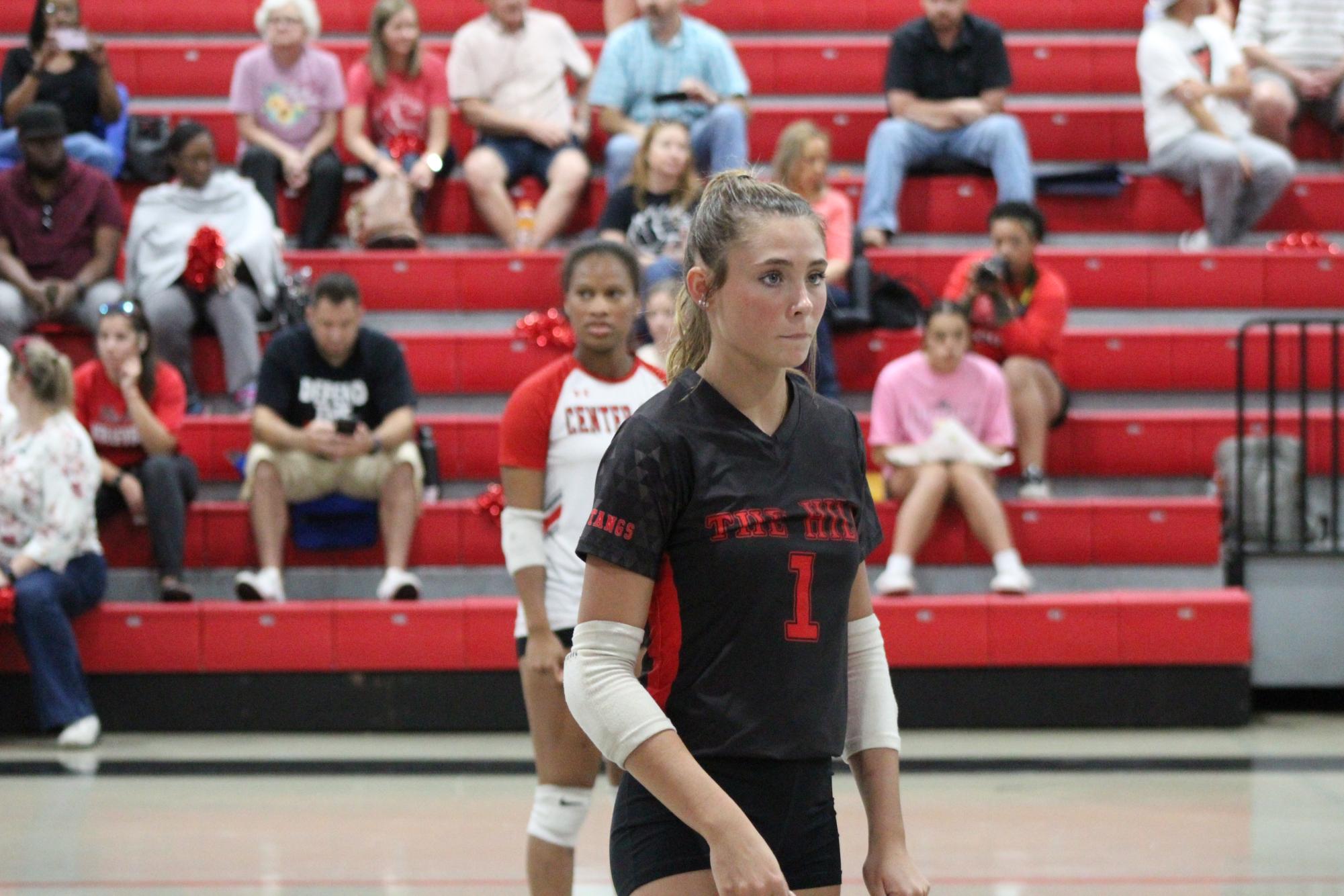 Volleyball celebrates win against South Panola for senior night.