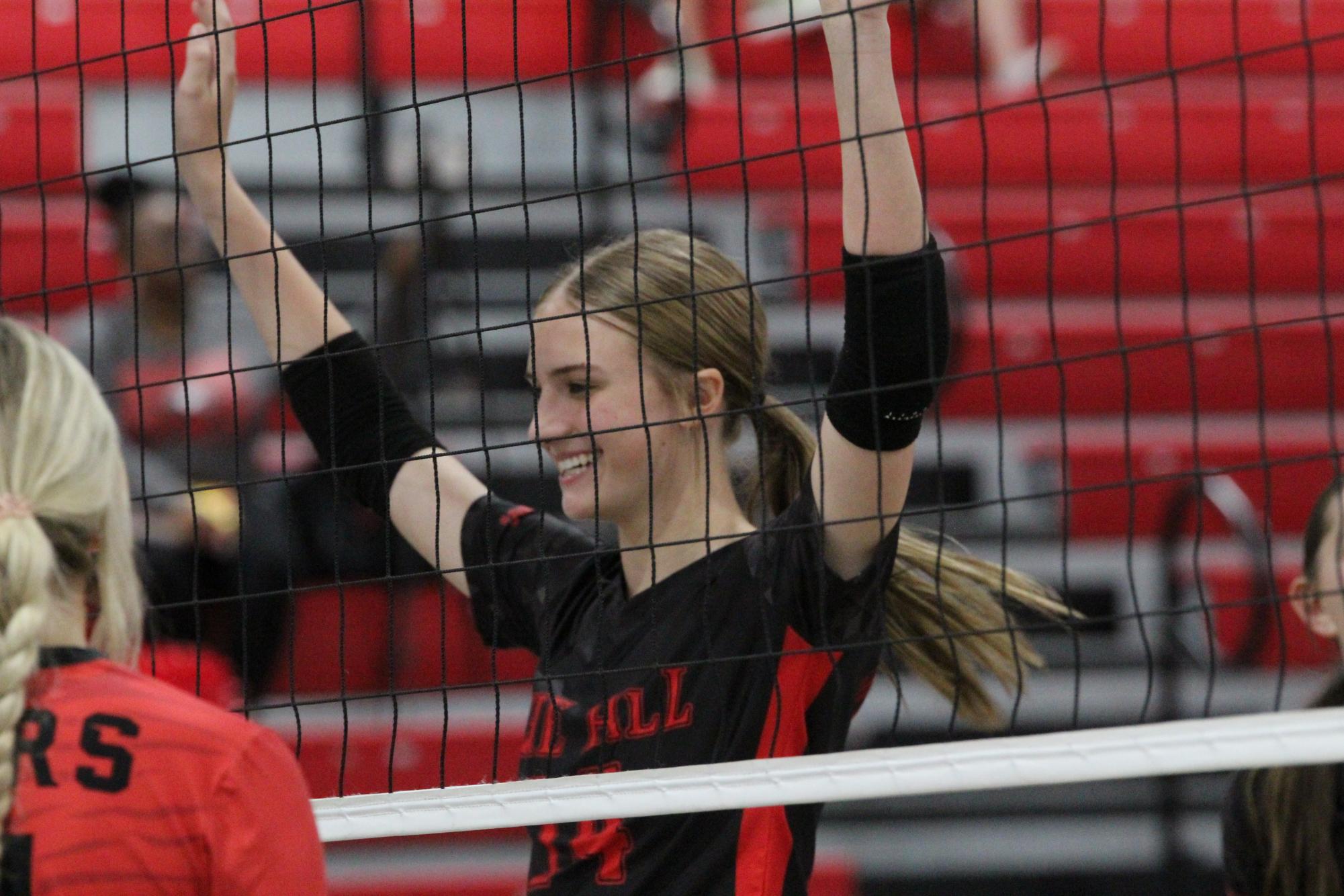 Volleyball celebrates win against South Panola for senior night.