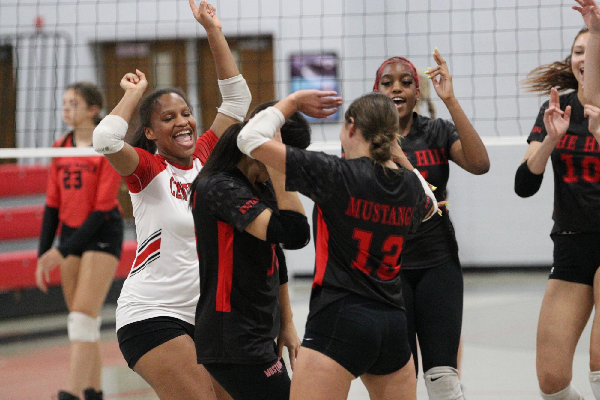 Volleyball celebrates win against South Panola for senior night.