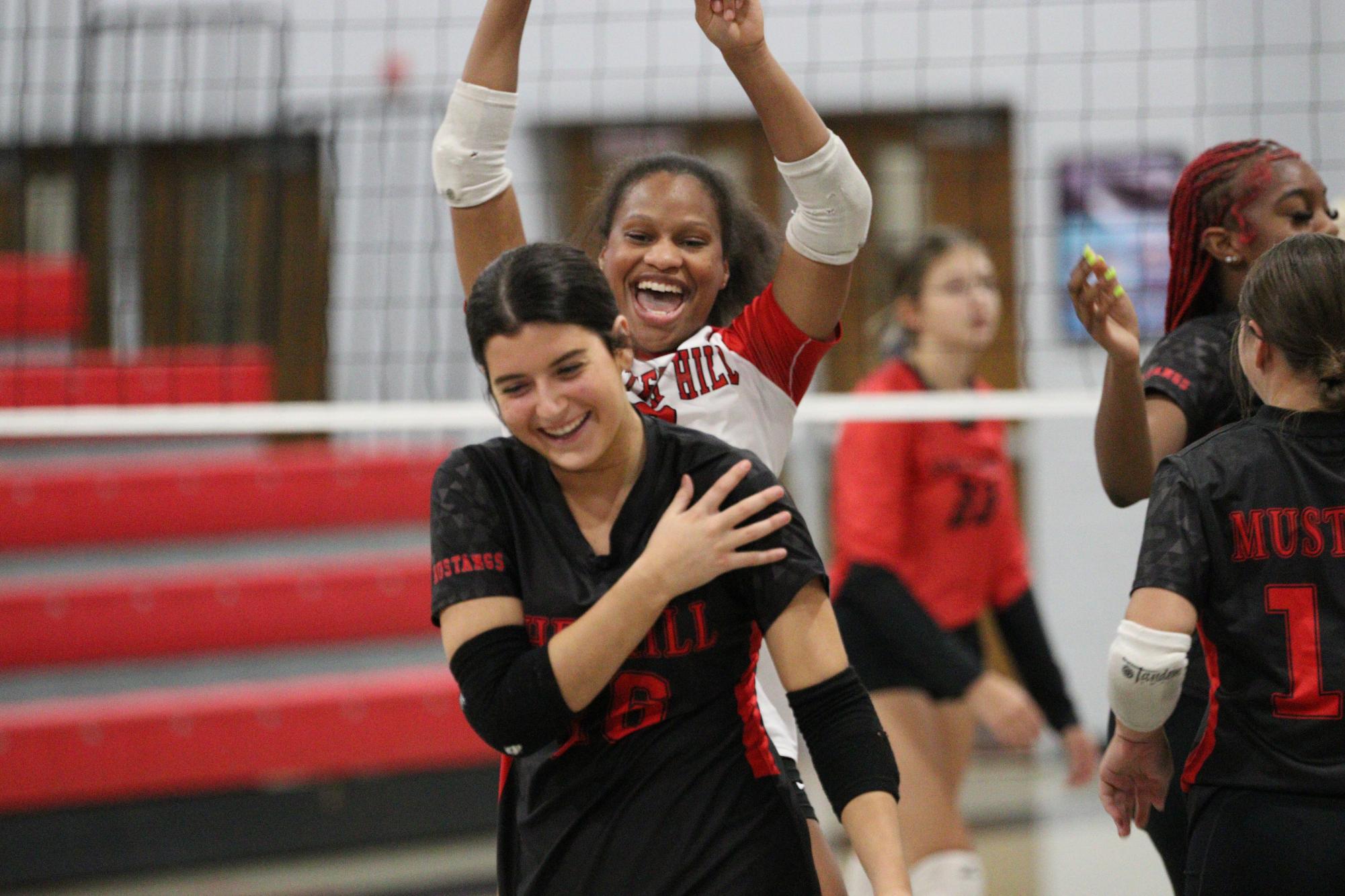 Volleyball celebrates win against South Panola for senior night.