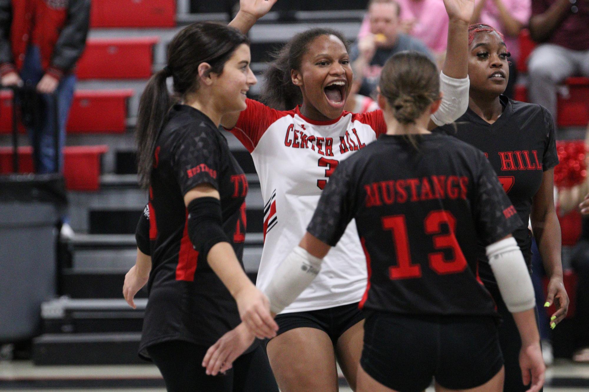 Volleyball celebrates win against South Panola for senior night.