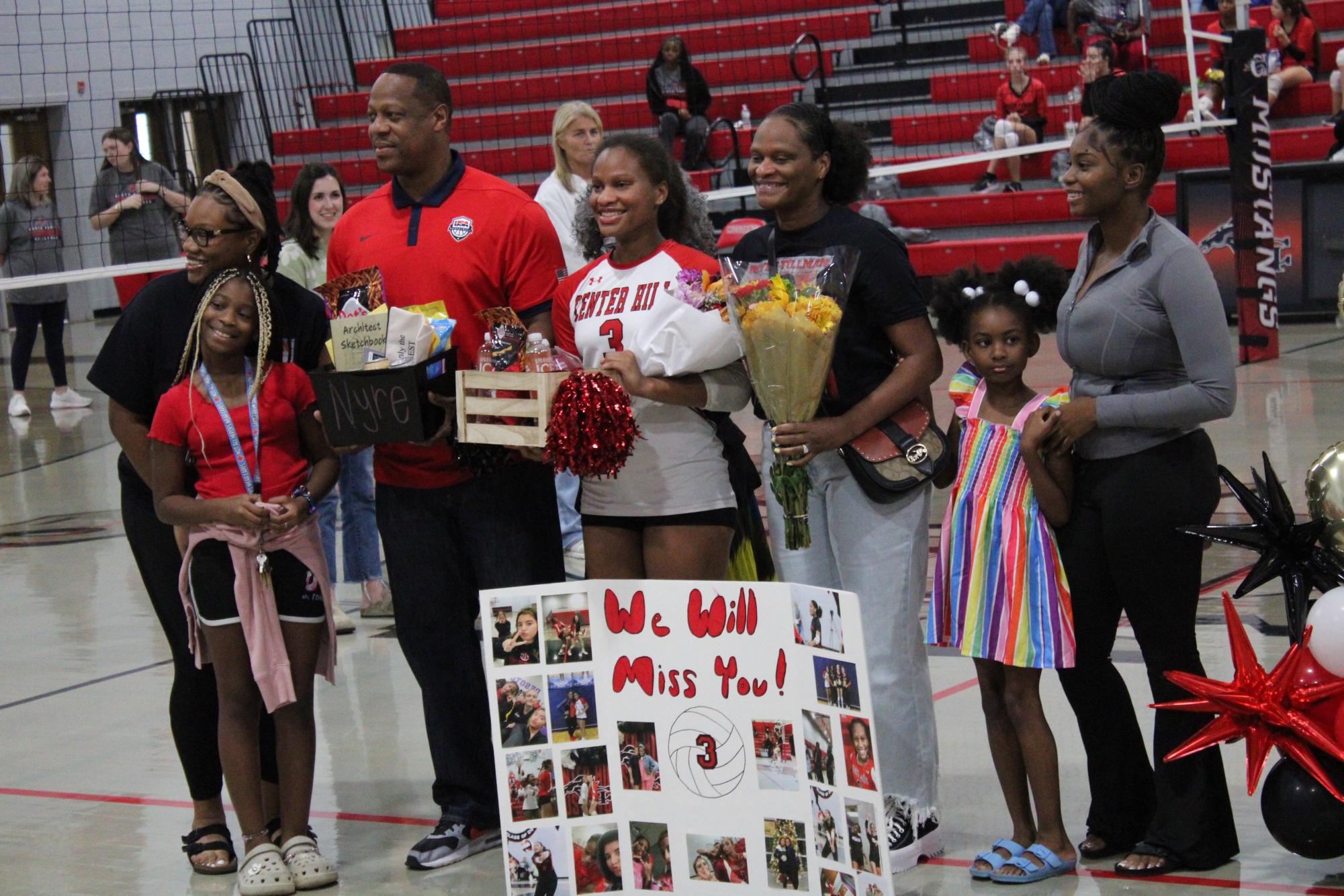 Volleyball celebrates win against South Panola for senior night.