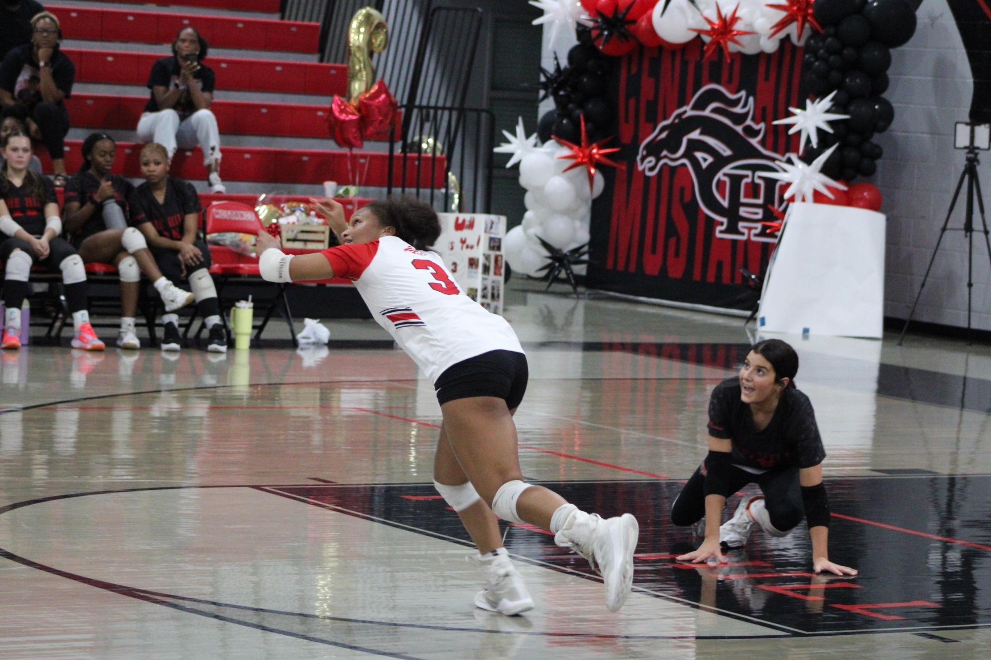 Volleyball celebrates win against South Panola for senior night.